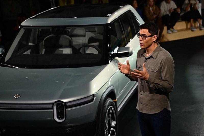 RJ Scaringe rivian zda amerika posel gospodarstvo zasluzek placa