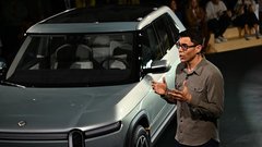 RJ Scaringe rivian zda amerika posel gospodarstvo zasluzek placa